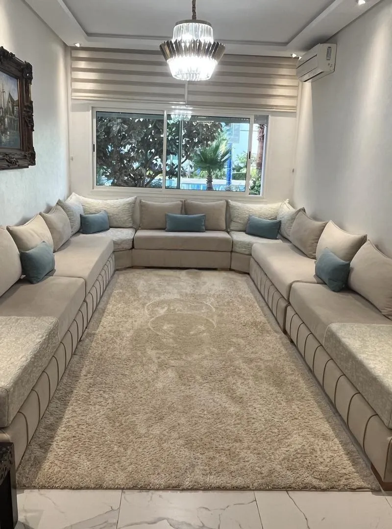 Salon en U avec tapis