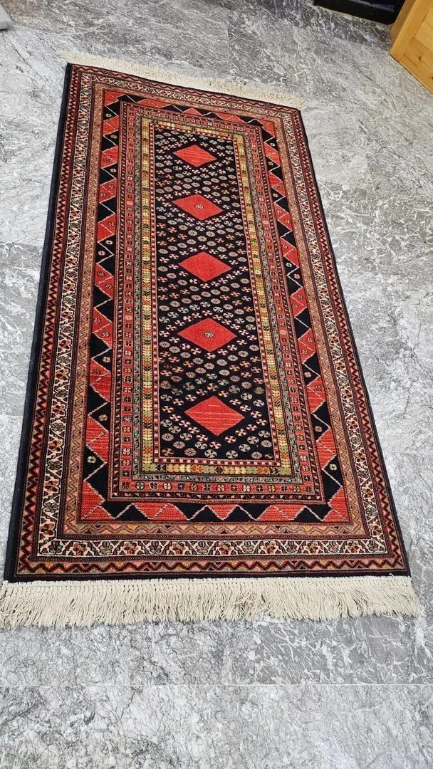 Tapis en laine véritable importé