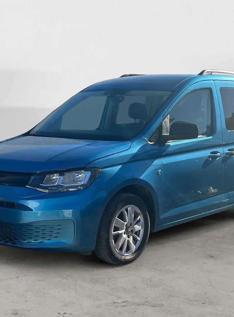 VOLKSWAGEN. Caddy