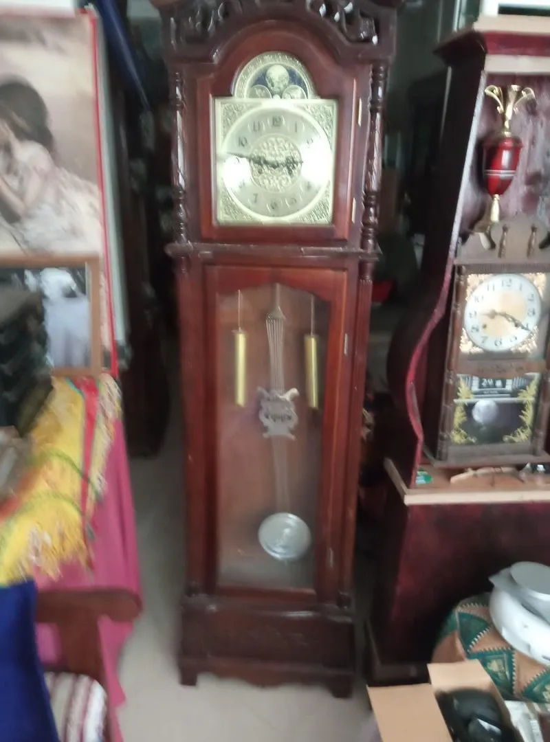 Horloge pendule mécanique ancienne