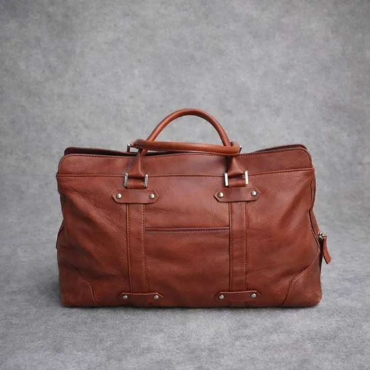 Superbe sac de voyage/travail en cuir .