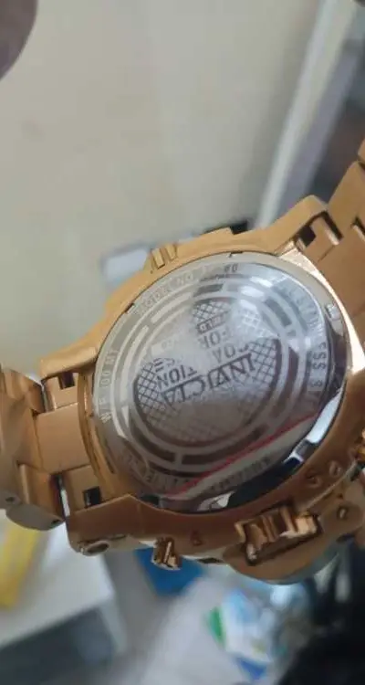 Montre homme invicta dorée jdida