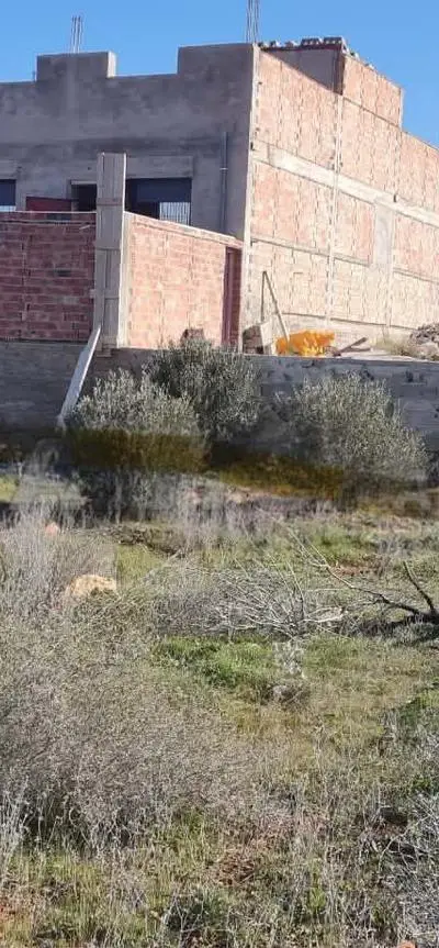 Terrain titré et constructible de 1080 m²