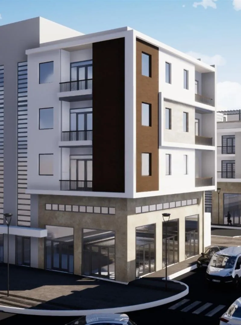 Terrain immeuble 3 étages commerce 2 faces plage Ifni