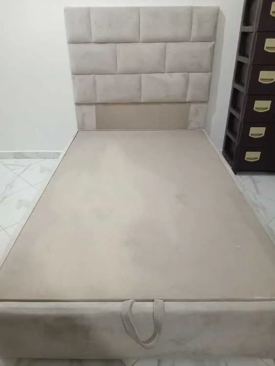 سرير لشخص واحد مع تخزين rangement