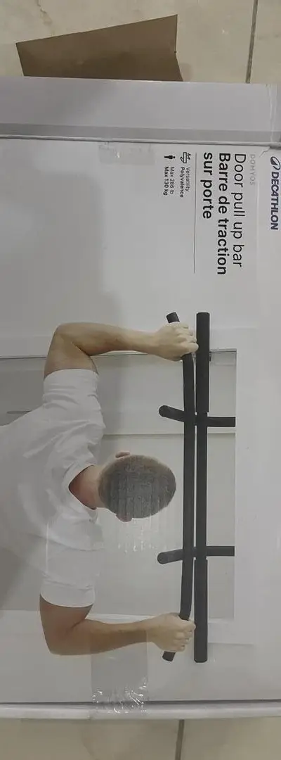 Barre fixe pour porte