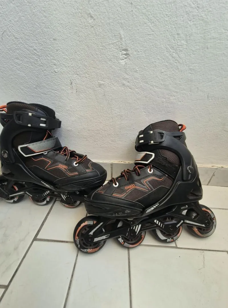 Patin Oxelo taille ajustable de 35 à 38 avec casque
