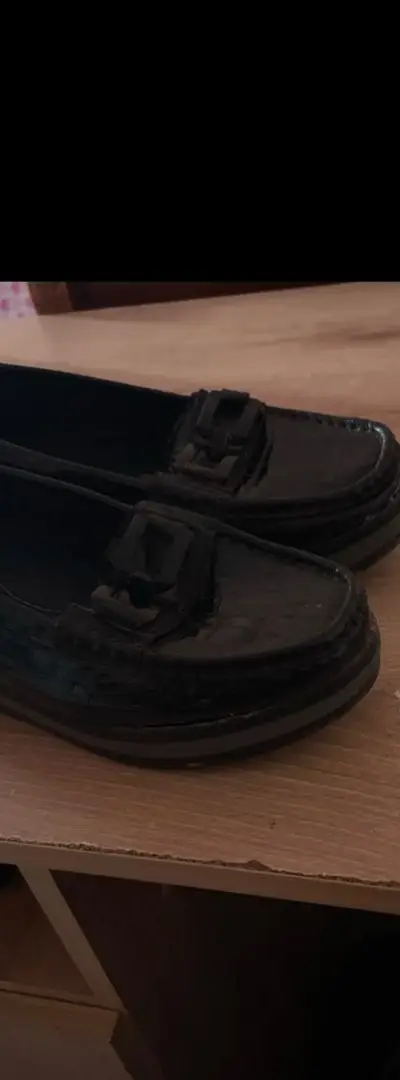 Mocassins noirs en bon état