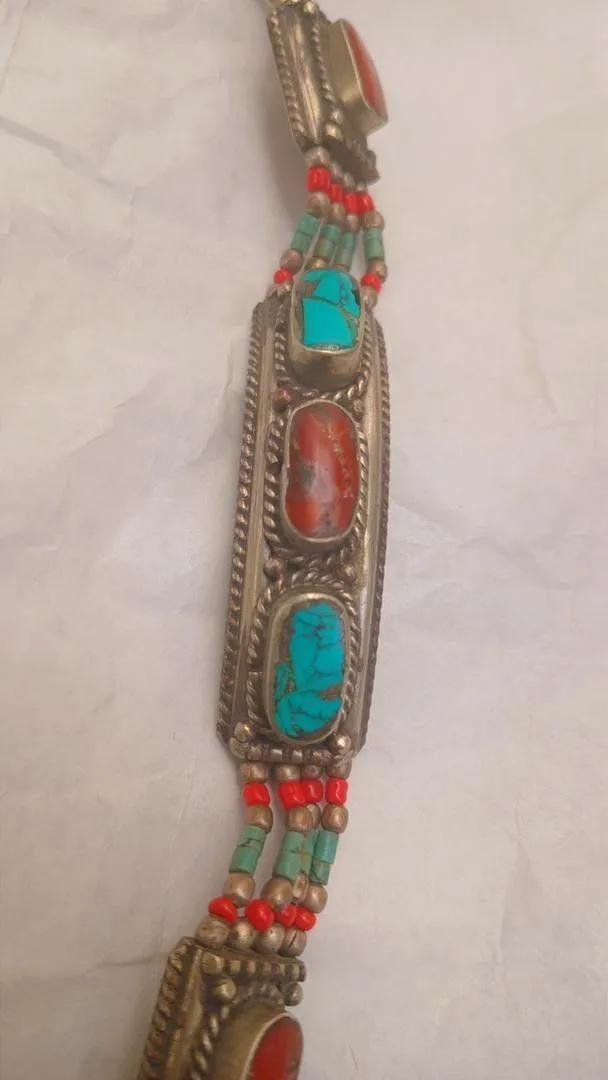 Bracelet en argent avec deux pierres turquoise