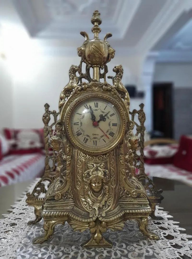 Horloge ancienne en bronze massif