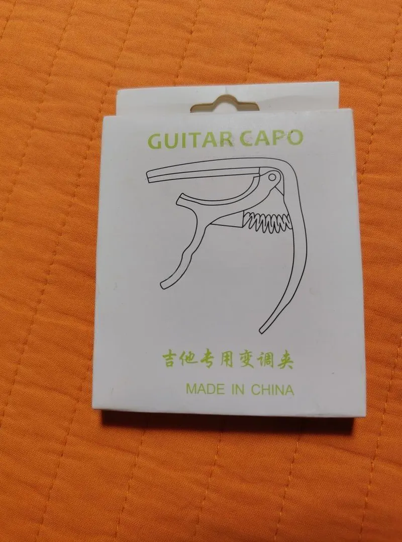 Capodastre de guitare neuf à vendre.