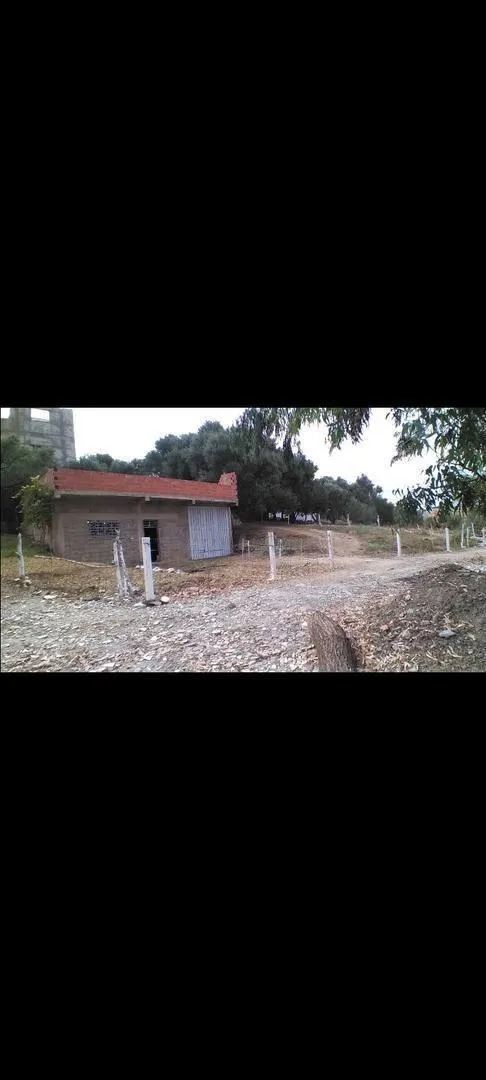 Terrain de 700 m² titré avec une maison construite