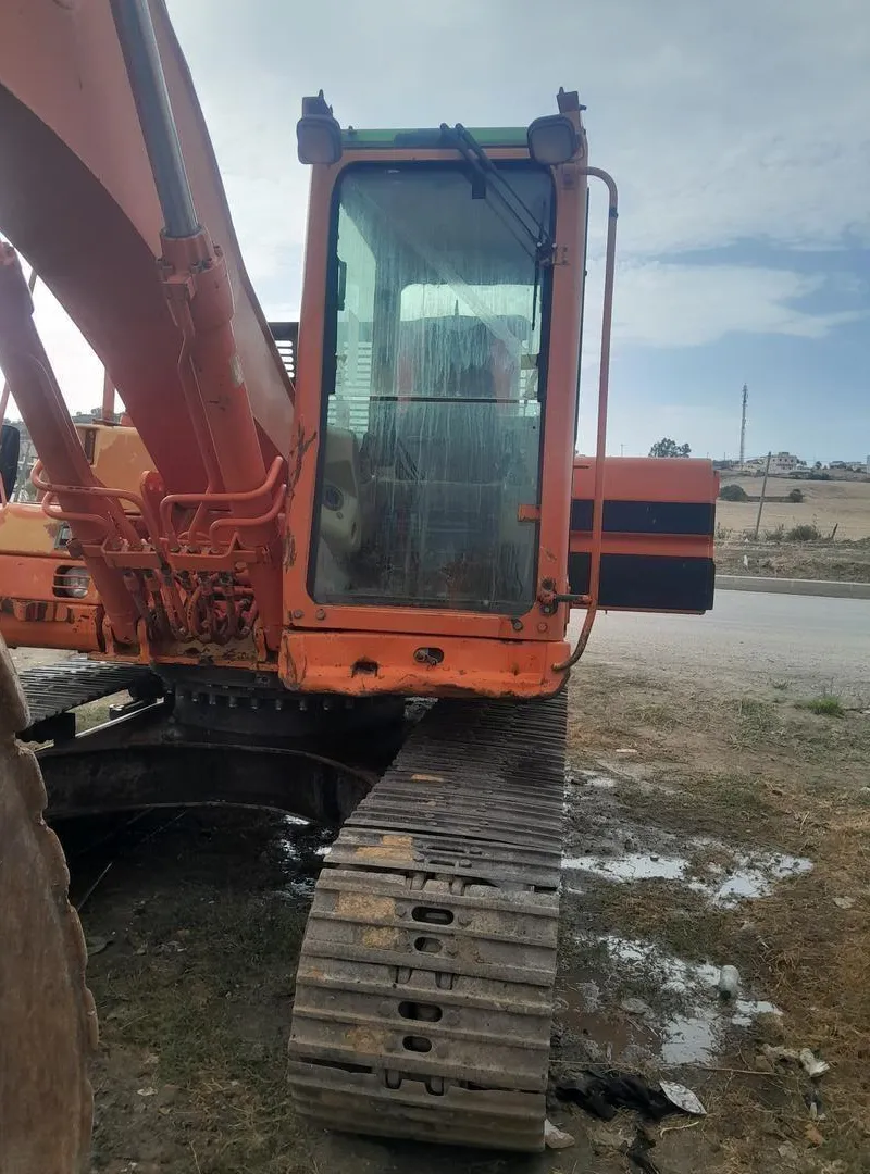 Poclain Caterpillar 320BL modèle 1999 dédouane 2024