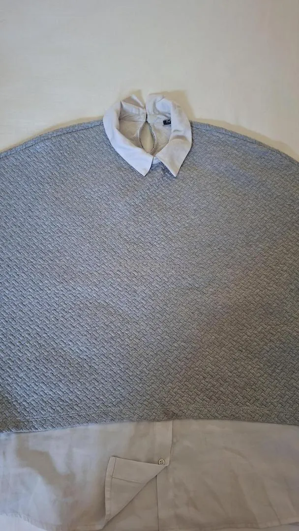 Pull gris élégant pour femme.