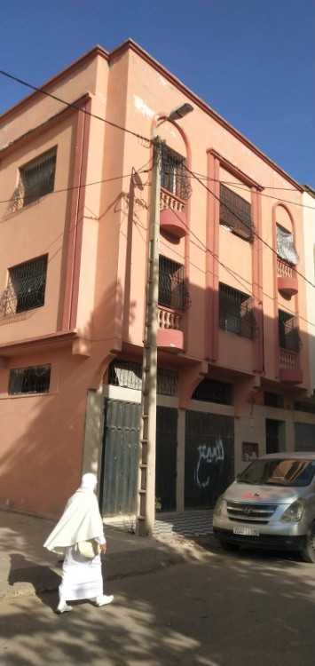 Immeuble à vendre – 2 appartements et 2 garages