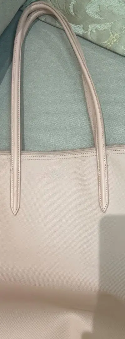 Sac Lacoste rose bon état