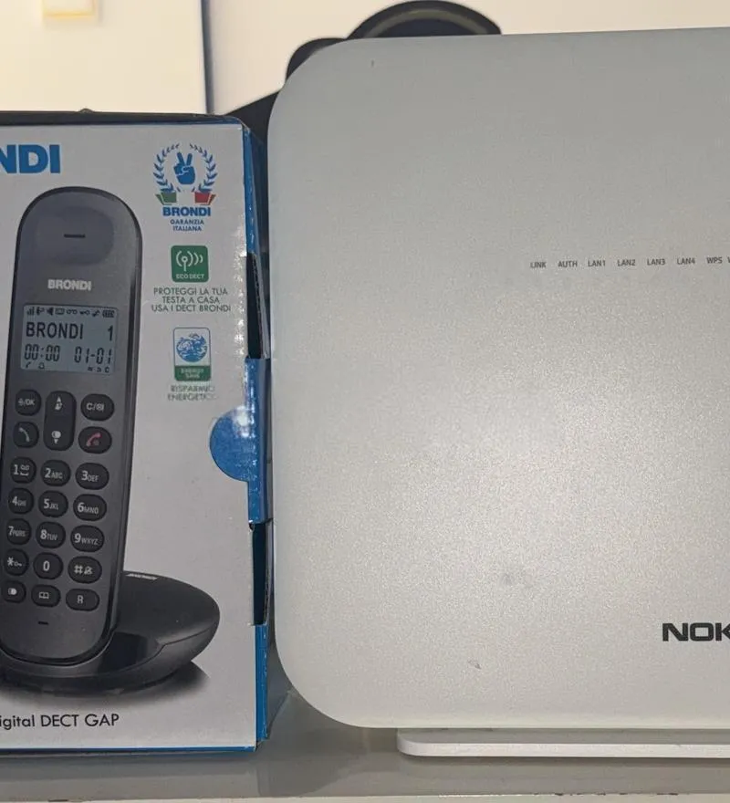 Téléphone fixe et routeur wifi comme neufs