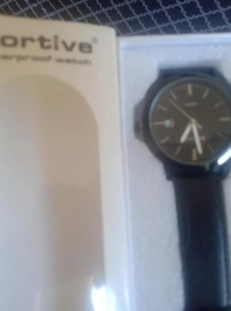 Montre homme élégante marque portive neuve 100/100
