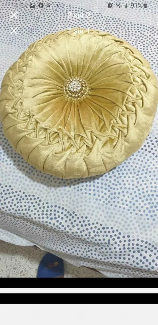 Nouveaux coussins dorés