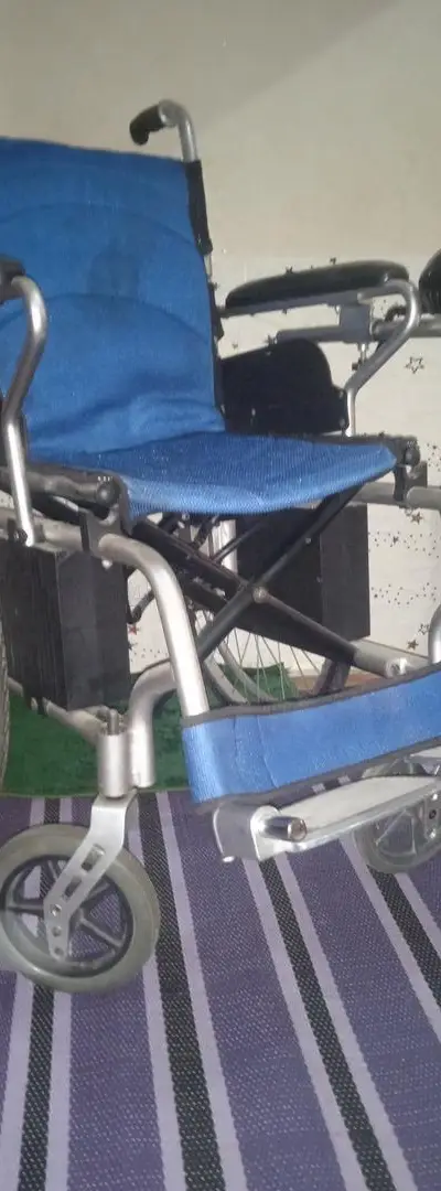 Fauteuil roulant électrique quasi neuf
