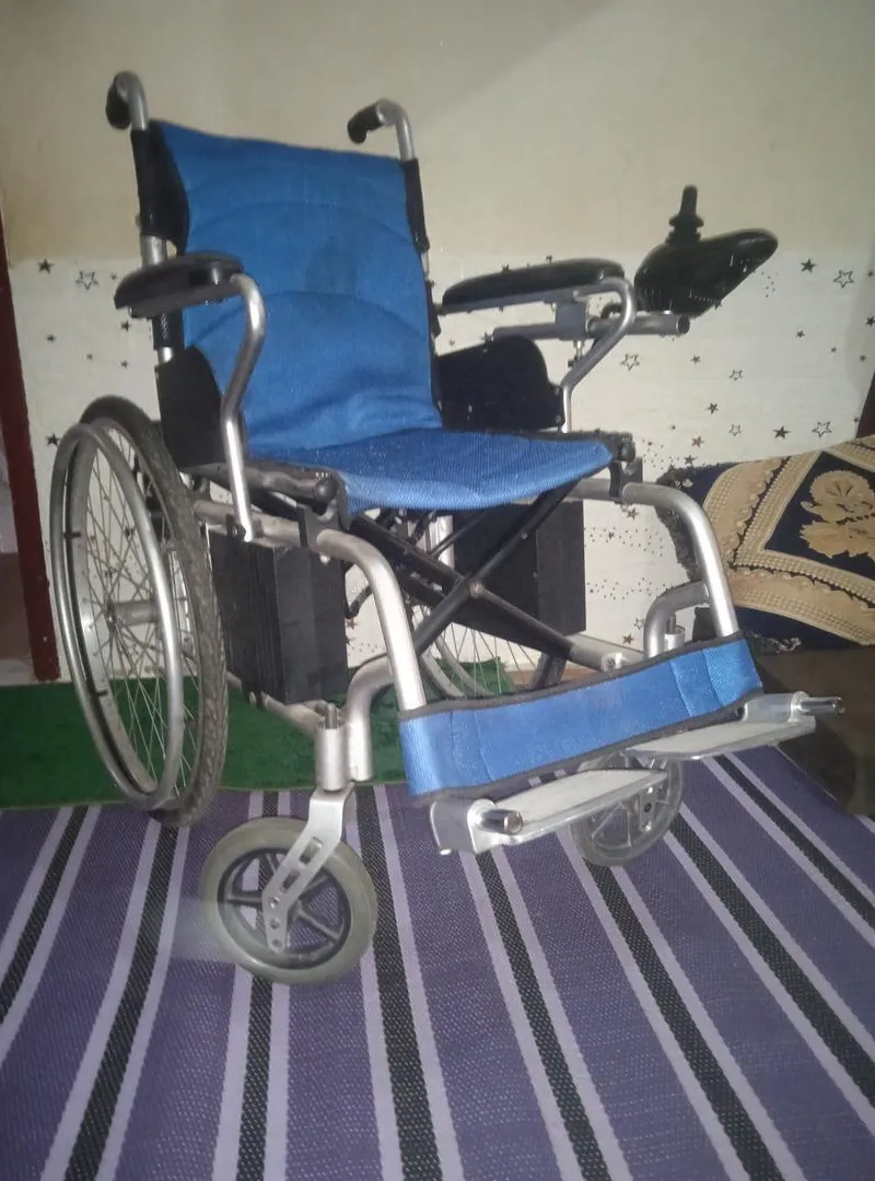 Fauteuil roulant électrique quasi neuf