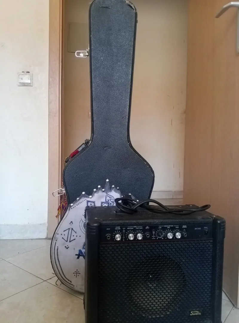 Boîte de guitare et ampli