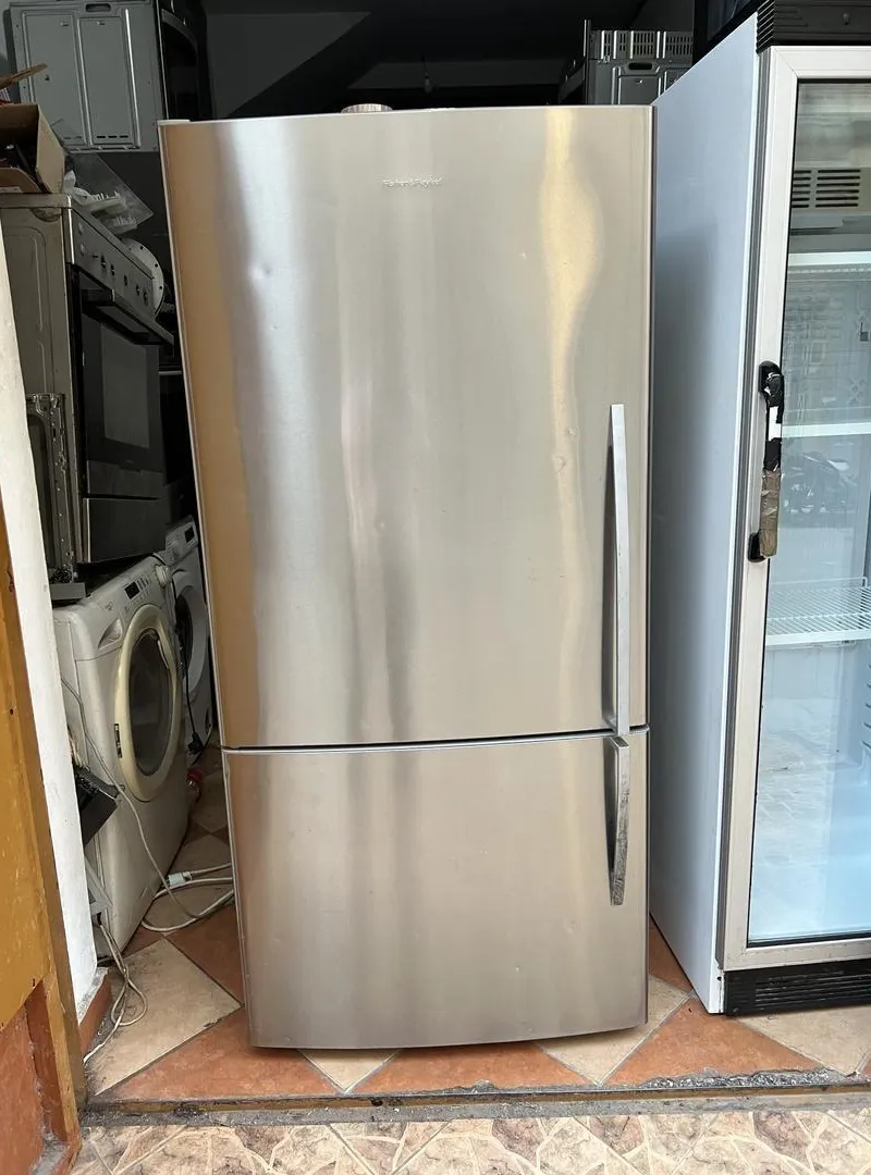 Réfrigérateur américain Inox très bon état