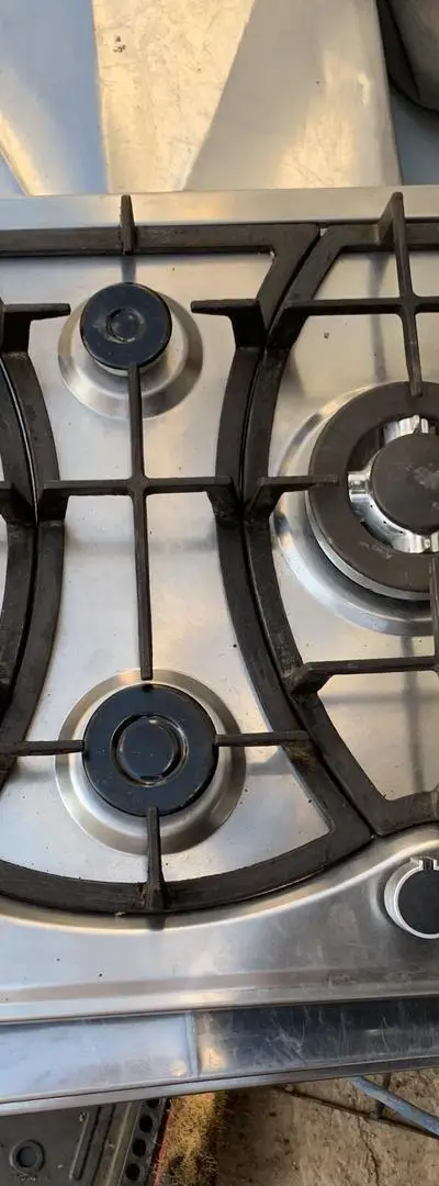 Four Inox Castri propre, bon état de marche, feu bleu