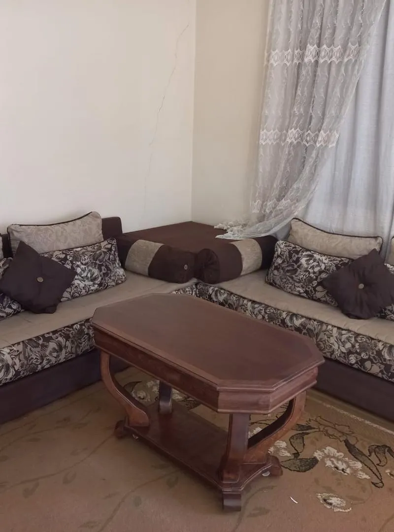 Salon en L bon état