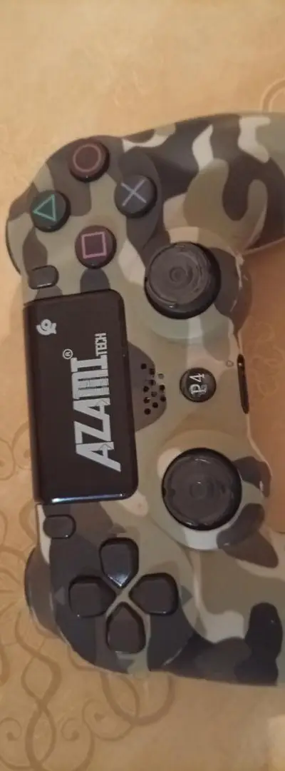 Manette PS4 fonctionne bien et charge