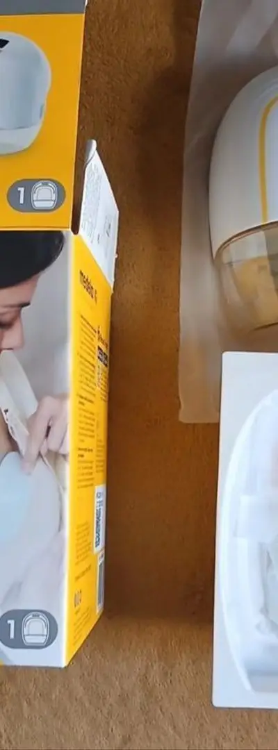 Tire-lait mains libres marque Medela
