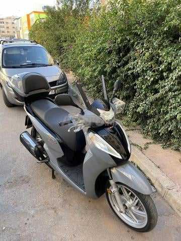 SH 300i n9ia wra9ha en regle