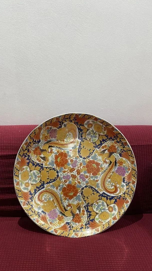 Ancien plat paon en cuivre