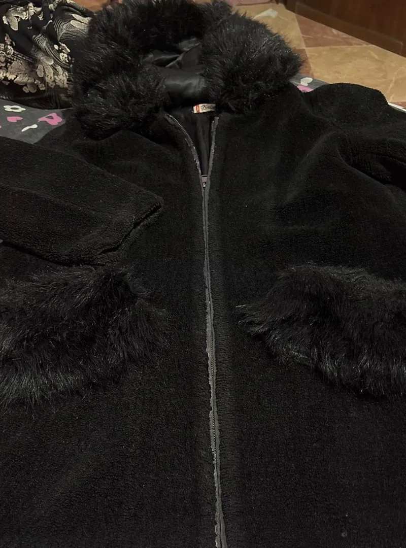 Manteau noir chaud en bon état